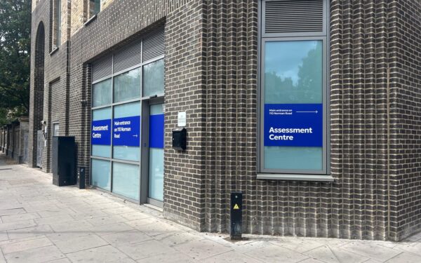 Photo of the Greenwich Assessment Centre with signage to entrance